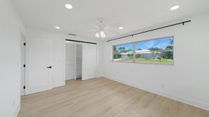Primary bedroom with organized closet